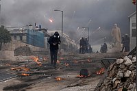 Flammen der Wut - © Petros Giannakouris/AP/dpa
