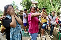 Viele Angeh&ouml;rige sind v&ouml;llig verzweifelt. - &copy; Jacqueline Hernandez/AP/dpa