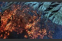 Dieses von Maxar Technologies bereitgestellte Satellitenbild zeigt das Eaton-Feuer am Mittwoch, 8. Januar 2025, in Altadena, Kalifornien. - © Uncredited/Maxar Technologies via AP/dpa