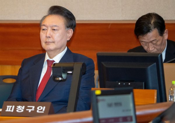 Auch nach dem jüngsten Urteil sind die juristischen Auseinandersetzungen für Yoon nicht beendet. (Archivfoto) - © Song Kyung-seok/Pool Kyodo News/dpa