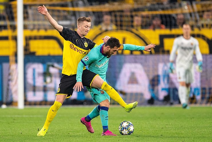In der Champions League trafen Reus und Messi nur sehr selten aufeinander. - © Marius Becker/dpa