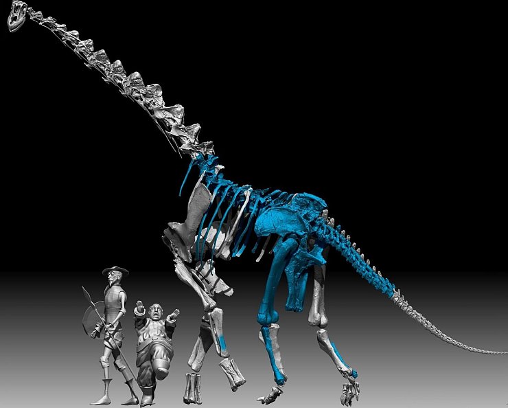 Die Romanfiguren Don Quichotte und sein Gehilfe Sancho Pansa sind in dieser Illustration neben dem neu entdeckten Dinosaurier zu sehen. - © Gbe-Uned/dpa