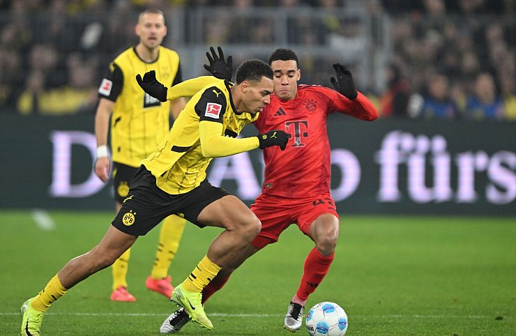 Aktuell in Topform: Dortmunds Felix Nmecha (l) - © Federico Gambarini/dpa