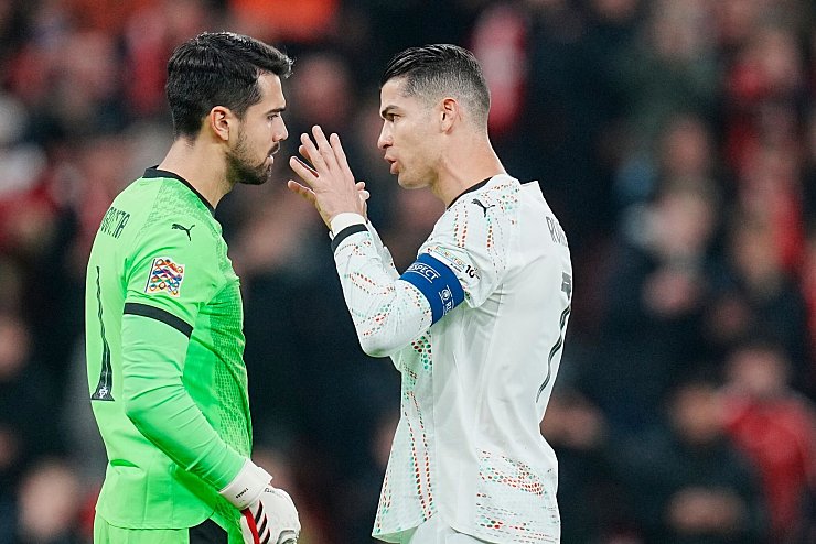 Konnte Portugal nicht helfen: Cristiano Ronaldo (r) - © Liselotte Sabroe/Ritzau Scanpix Foto/AP/dpa