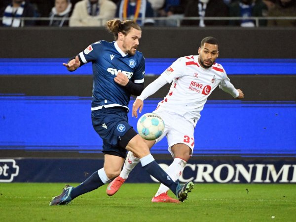 Linton Maina verletzte sich im Spiel gegen den Karlsruher SC und fällt vorerst aus. - © Uli Deck/dpa