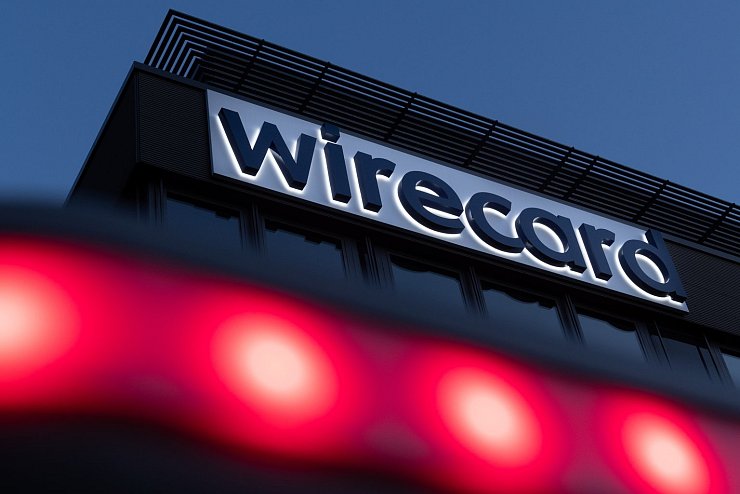 Wirecard-Logo an der Firmenzentrale - &copy; Foto: Peter Kneffel/dpa