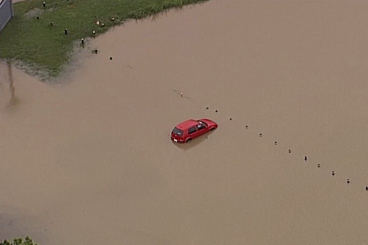Überflutung - © Foto: -/Australian Broadcasting Corporation, Channel 7, Channel 9/AP/dpa