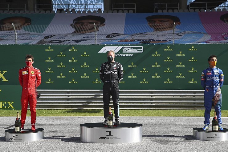 Podium - © Foto: Mark Thompson/pool Getty/AP/dpa