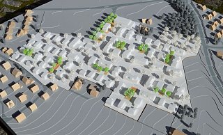 Vor knapp 1,5 Jahren wurde der Siegerentwurf für das Quartier Brunsheide mit diesem Modell, rechts liegt die Herforder Straße, auch bei der Siegerehrung in der Öffentlichkeit vorgestellt. Mittlerweile wurden die Pläne spezifiziert. Foto: Drees & Huesmann - Drees & Huesmann