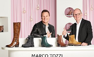 Guido Maria Kretschmer wirbt für Marco Tozzi - das freut auch den Vertriebsgeschäftsführer Christian Böhm. - Wortmann-Gruppe