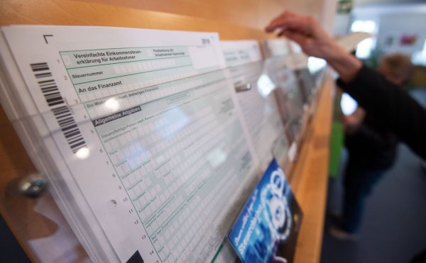 SPD, Grüne und FDP wollen Entlastungen für die Bürger beschließen. (Archivfoto) - © Marijan Murat/dpa