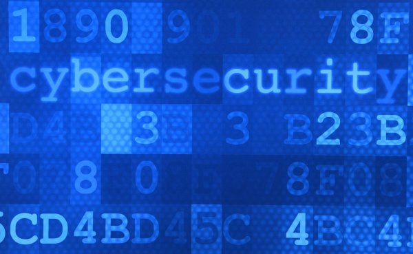 Das Wort «Cybersecurity» steht auf einem Plakat. - © Ralf Hirschberger/dpa-Zentralbild/dpa/Illustration