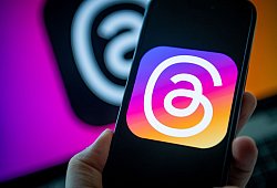 Logo der Meta App Threads auf einem Smartphone - Zacharie Scheurer/dpa-tmn