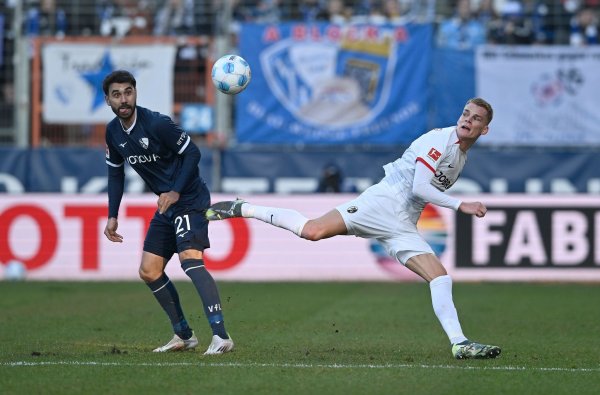 Gerrit Holtmann (l) will in Kiel endlich den ersten Auswärtssieg mit dem VfL Bochum holen. - © Anke Waelischmiller/dpa