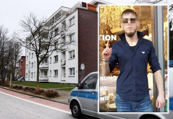 Der 22. Januar 2015: Ein Polizeiwagen steht vor einem Haus am Westring. Daneben Sebastian B. mit dem erhobenen Finger, einer typischen Geste,
mit der Salafisten oft posieren. - © Frank-Michael Kiel-Steinkamp