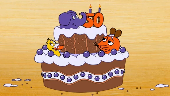 Der kleine Elefant, die Maus und die Ente sitzen auf einer Torte - am 5. Januar 2025 hat der Elefant seinen 50. Geburtstag. (Bild: WDR) - © Friedrich Streich/Trickstudio Lutterbeck WDR/dpa