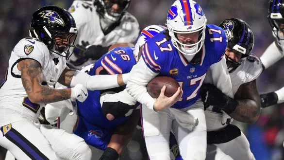 Josh Allen (rechts) erledigte, was erledigt werden musste für die Bills. - © Adrian Kraus/AP/dpa