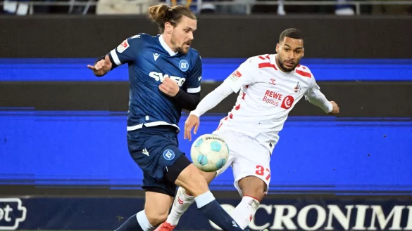 Linton Maina verletzte sich im Spiel gegen den Karlsruher SC und fällt vorerst aus. - © Uli Deck/dpa