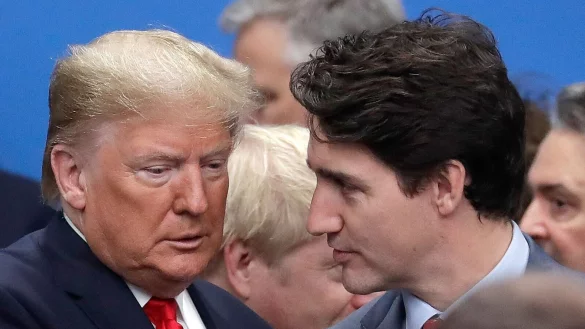 Die angekündigten Zölle, würden für einen Monat ausgesetzt, schrieb der kanadische Premier Justin Trudeau. (Archivbild) - © Evan Vucci/AP/dpa