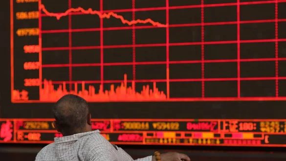 Alles rot - an den Aktienm&auml;rkten geht es dramatisch abw&auml;rts. (Symbolbild) - &copy; Ng Han Guan/AP/dpa