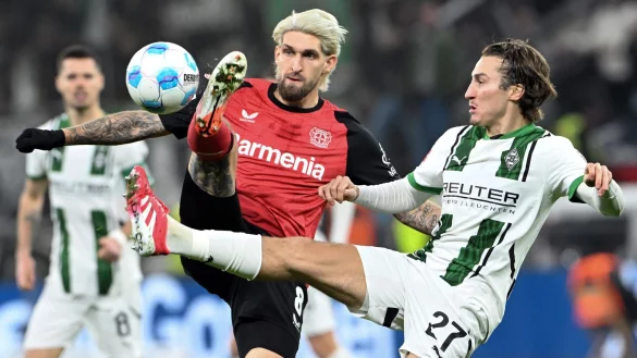 Reitz (r) fehlt den Gladbachern einige Zeit. - © Federico Gambarini/dpa