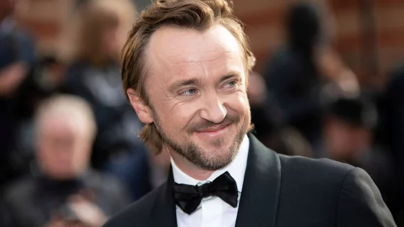 Berühmt wurde er als der blonde Erzrivale Draco Malfoy: Tom Felton kehrt ins Harry-Potter-Universum zurück. (Archivbild) - © Vianney Le Caer/Invision via AP/dpa