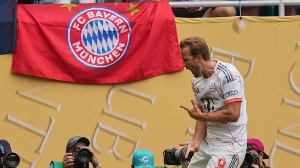 Harry Kane jubelt nach seinem ersten Tor. - © Lynne Sladky/AP/dpa