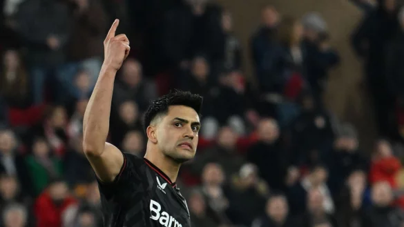 Leverkusens Nadiem Amiri jubelt nachdem er den zweiten Elfmeter verwandelt hat. - &copy; Federico Gambarini/dpa