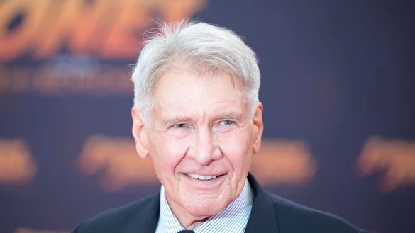 Schauspieler Harrison Ford steht auf dem roten Teppich bei der Deutschlandpremiere des Films &laquo;Indiana Jones und das Rad des Schicksals&raquo; im Zoo Palast in Berlin. - &copy; Hannes Albert/dpa