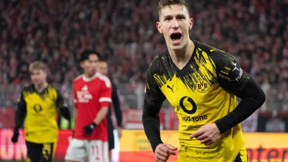 Nico Schlotterbeck bejubelt seinen Kopfballtreffer zum 2:0. - &copy; Soeren Stache/dpa