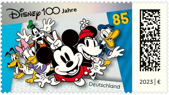 Micky Mouse, Donald Duck und andere Comicfiguren sind auf einer deutschen Briefmarke zu sehen. - © Disney/dpa