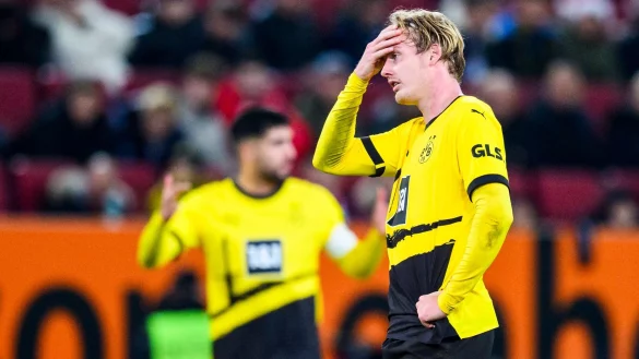 Unzufriedene Gesichter: Borussia Dortmund kam in Augsburg nur zu einem Remis. - &copy; Tom Weller/dpa