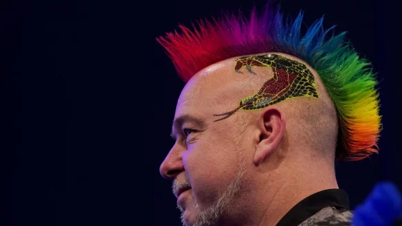Geht selbstbewusst in die Darts-WM: Titelverteidiger Peter Wright. - &copy; Tess Derry/PA Wire/dpa