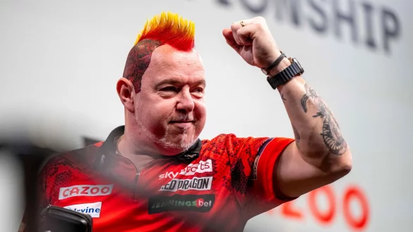 Peter Wright jubelt nach dem Sieg über Ryan Meikle. - © David Inderlied/Deutsche Presse-Agentur GmbH/dpa