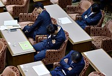 Japan - Schlafmangel - Franck Robichon/EPA/dpa