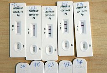 Corona Test - Wolfgang Kumm/dpa