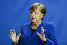 Merkel warnt vor R&uuml;ckfall in der Corona-Krise - Foto: Markus Schreiber/AP/POOL/dpa