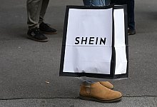 Einkaufstüte von Shein - Julien Mattia/Le Pictorium via ZUMA Press/dpa