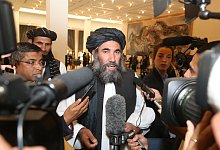 USA und Taliban - Foto: Hussein Sayed/AP/dpa