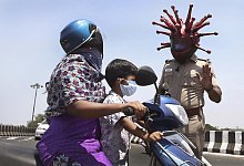 Indien - Foto: R. Parthibhan/STR/AP/dpa