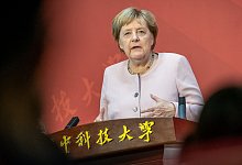 Merkel in China - Foto: Michael Kappeler