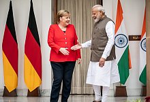 Kanzlerin Merkel in Indien - Foto: Michael Kappeler/dpa