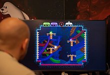 Ansicht des Online-Games «Karma Zoo». - Laura Ludwig/dpa-tmn