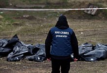 Die Ukraine spricht in mehr als 15.000 Fällen von Kriegsverbrechen. - Carol Guzy/ZUMA Press Wire/dpa
