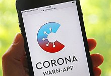Corona-Warn-App bekommt neues Feature - Foto: Oliver Berg/dpa