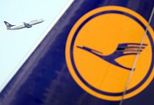 Lufthansa setzt Corona-Schnelltests ein - Foto: Arne Dedert/dpa
