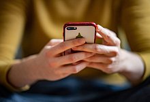 Smartphone - Fabian Sommer/dpa/Illustration