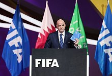 Fifa-Präsident Gianni Infantino rief in Doha zum Frieden auf. - Christian Charisius/dpa