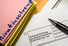 Überschuldung und Privatinsolvenz - Alexander Heinl/dpa
