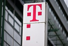 Deutsche Telekom AG Logo - Martin Schutt/dpa
